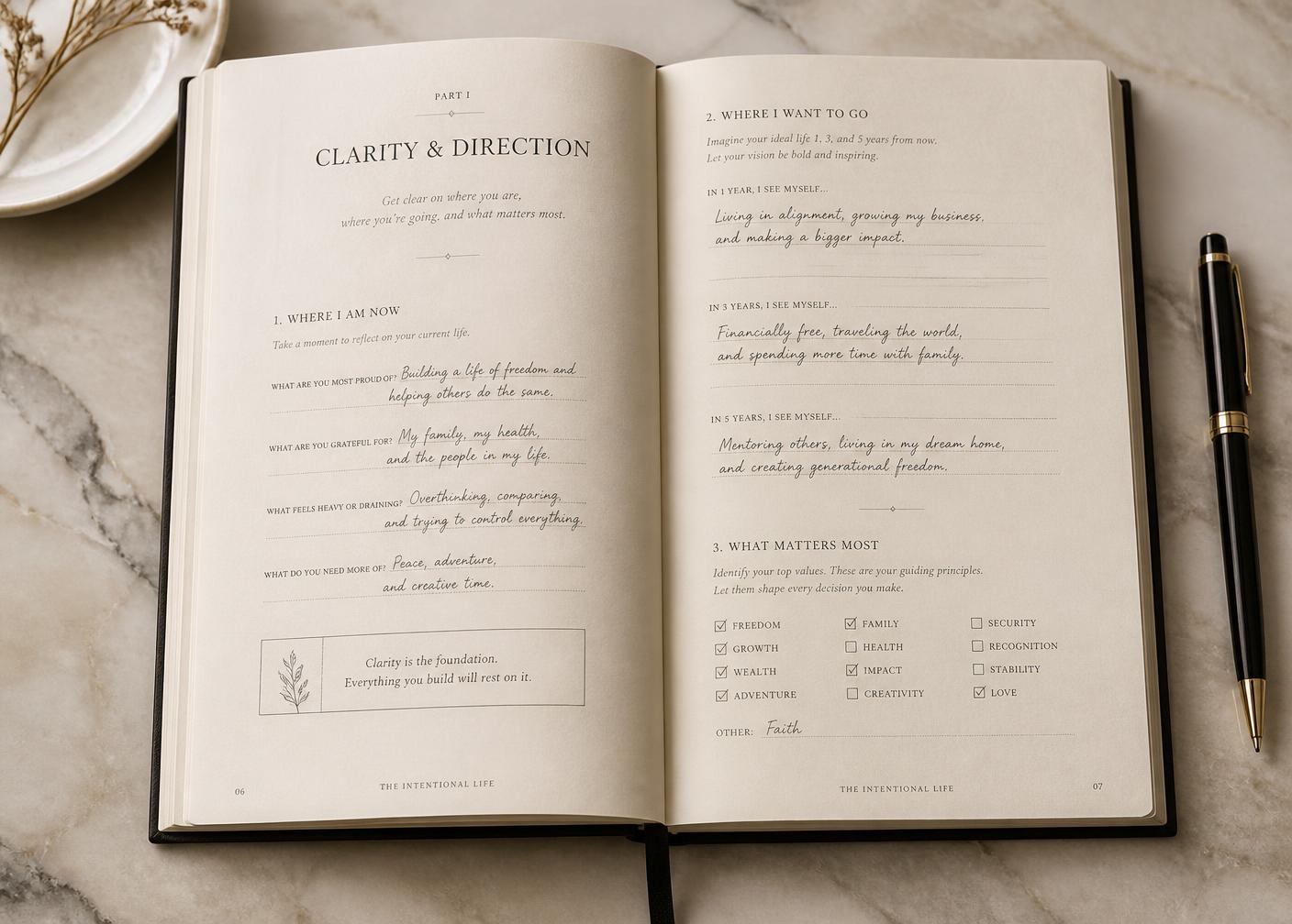 An open spread of the Not Someday workbook on a marble surface